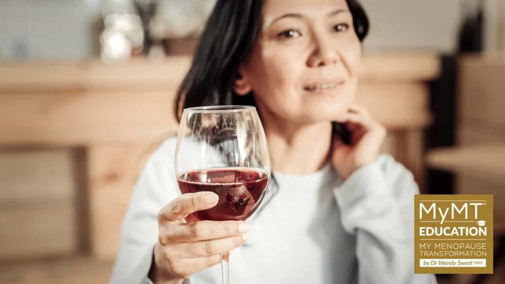 Woman holding wine glass and logo