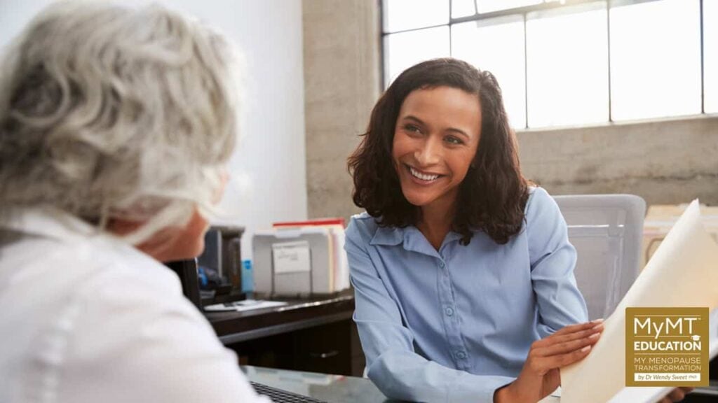 Coaching Image talking to older woman and logo